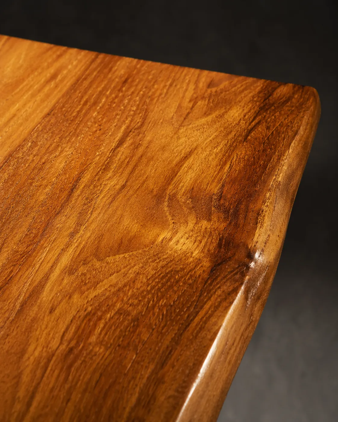 A-grade plantation teak surface detail, Ubud Atelier furniture material sourced from certified Indonesian suppliers